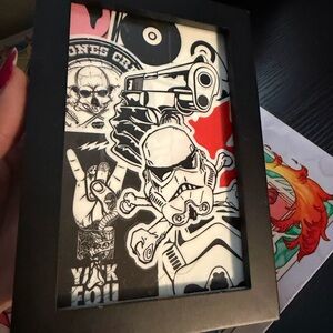 Framed Graphic Art with Skulls and Stormtrooper